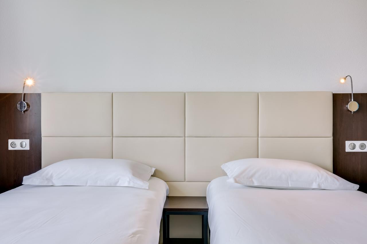 อินิเชียล บาย บัลลาแด็ง ก็อง เมโมเรียล Hotel ภายนอก รูปภาพ